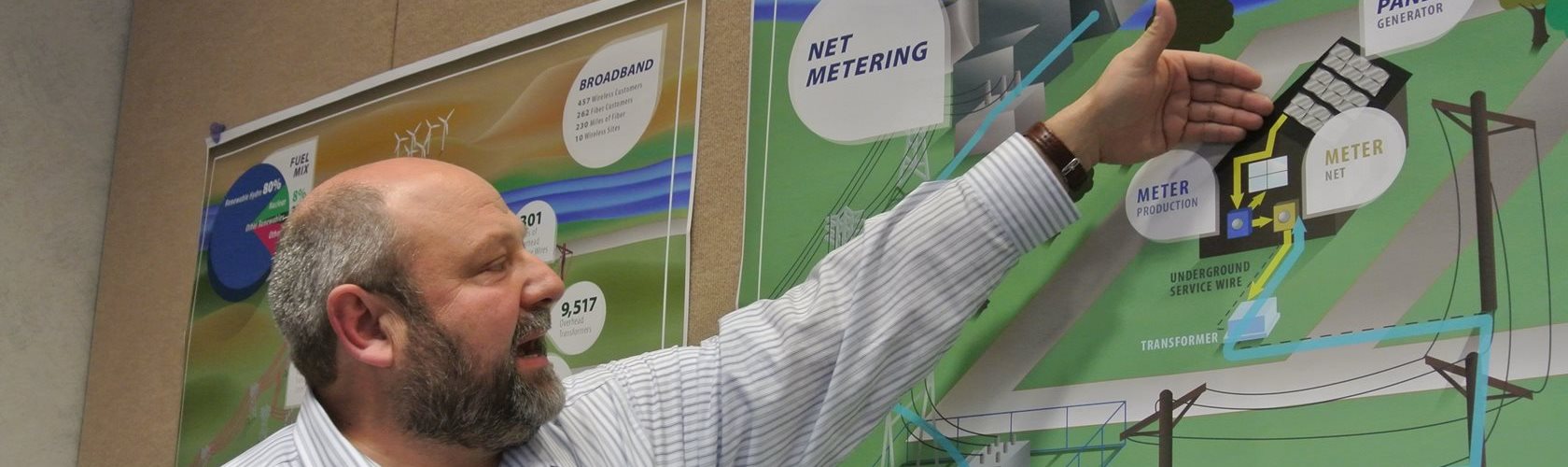 Photograph of Benton PUD employee giving presentation on net metering.